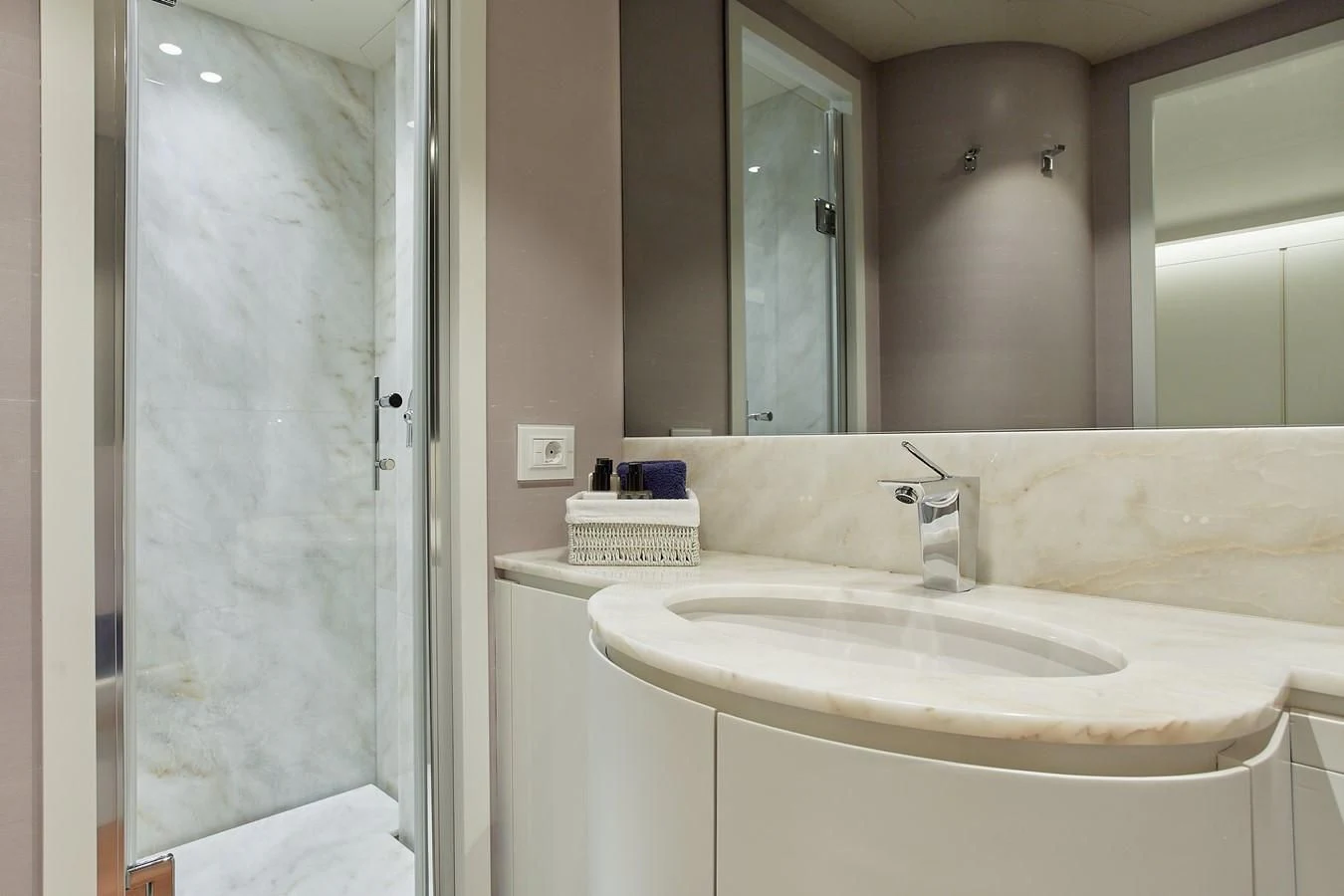 a bathroom with a sink and a shower aboard EVA Yacht for Charter