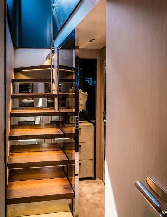 a door with a glass case aboard SESSANTASETTE 67 Yacht for Sale