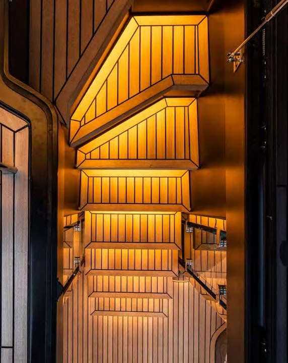 a staircase with a light aboard SESSANTASETTE 67 Yacht for Sale