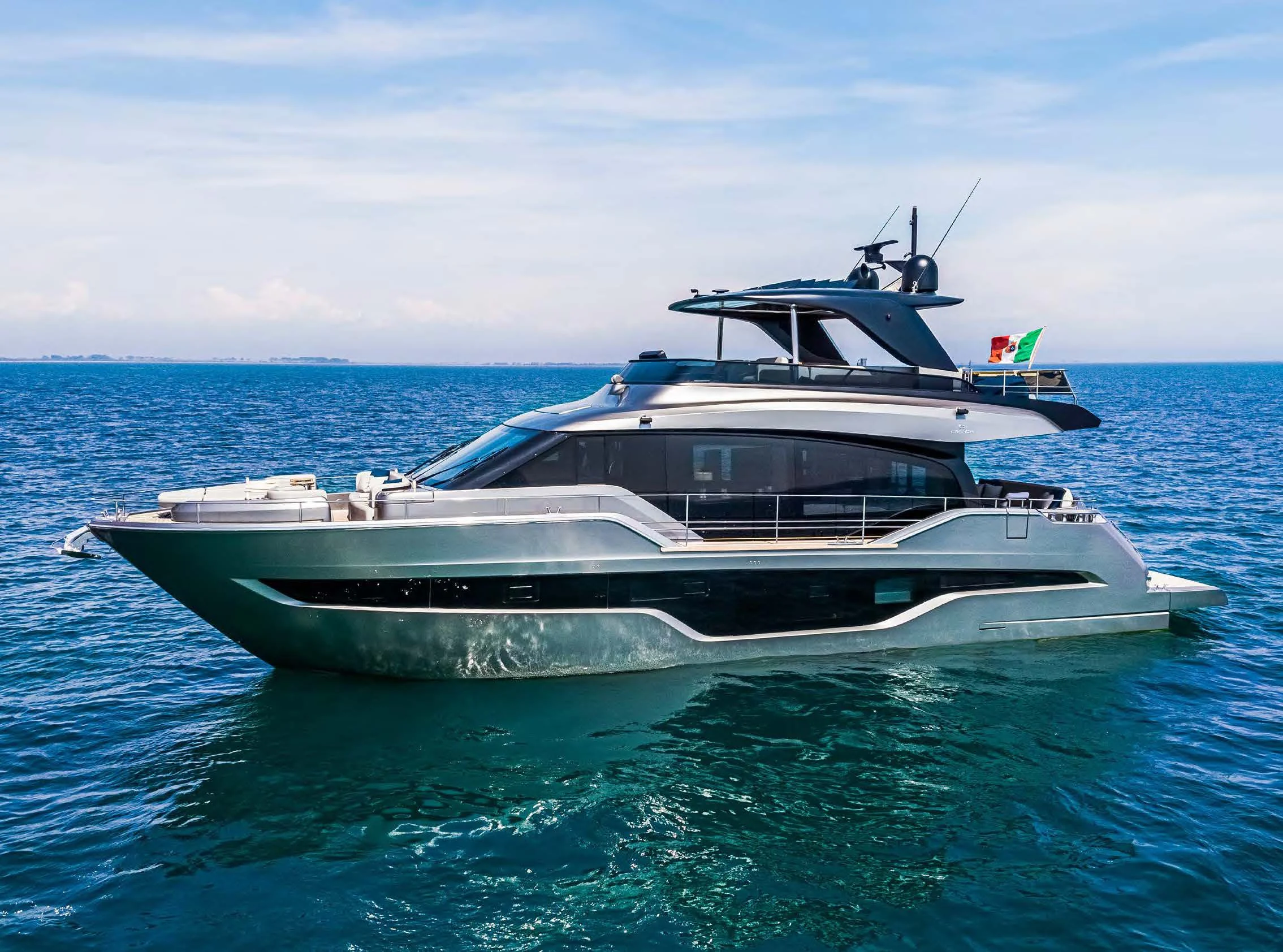 a boat in the water aboard SESSANTASETTE 67 Yacht for Sale