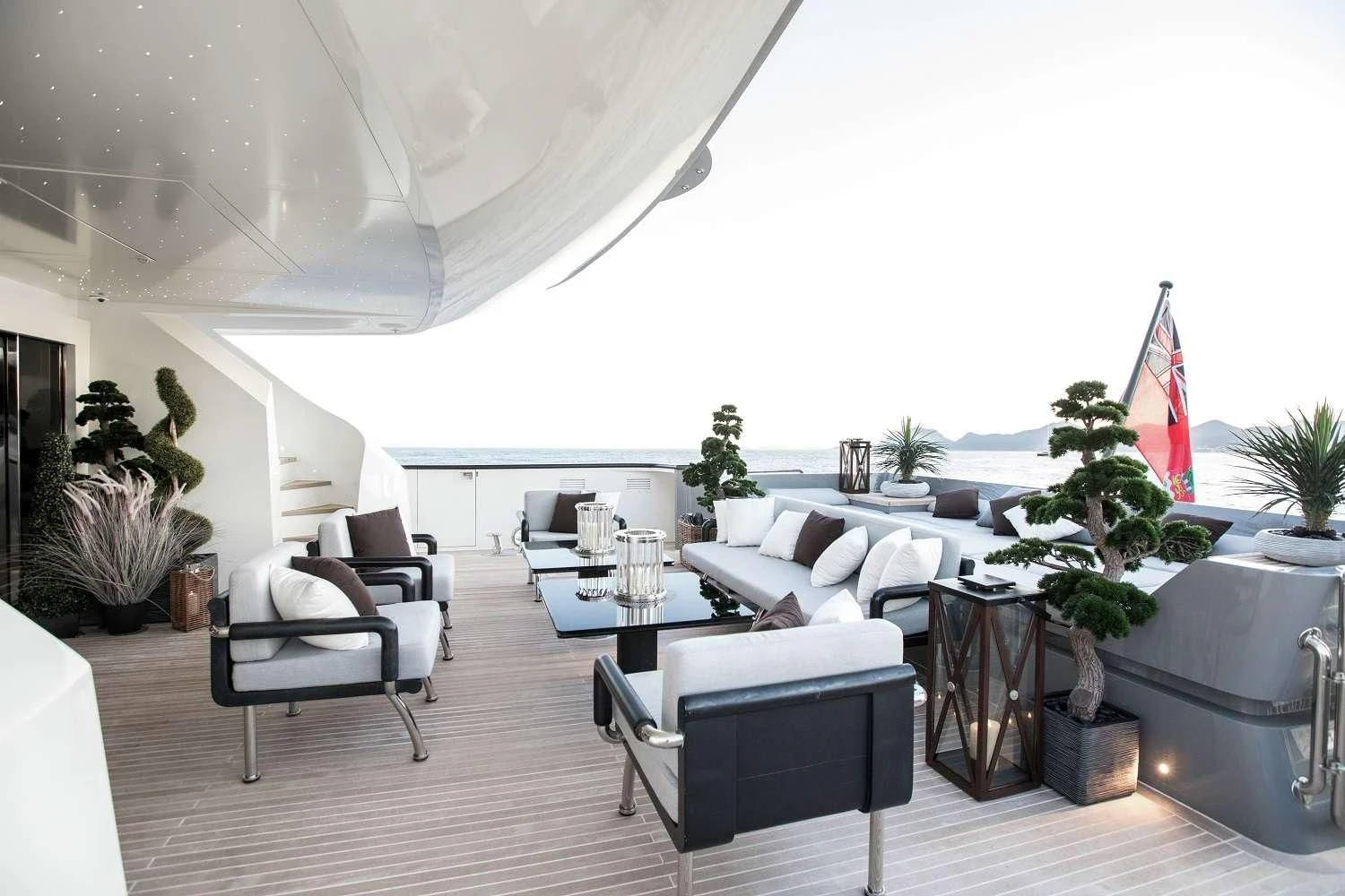 a large room with a couch and a table and chairs aboard GEMS 2 Yacht for Sale
