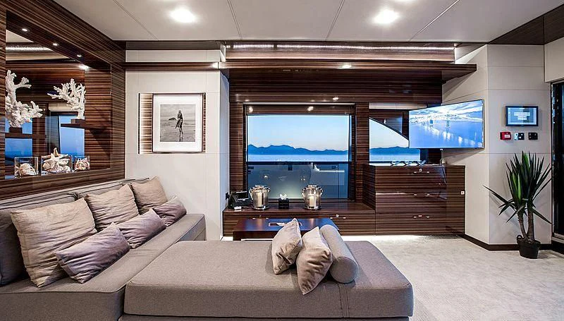 a living room with a large window aboard GEMS 2 Yacht for Sale