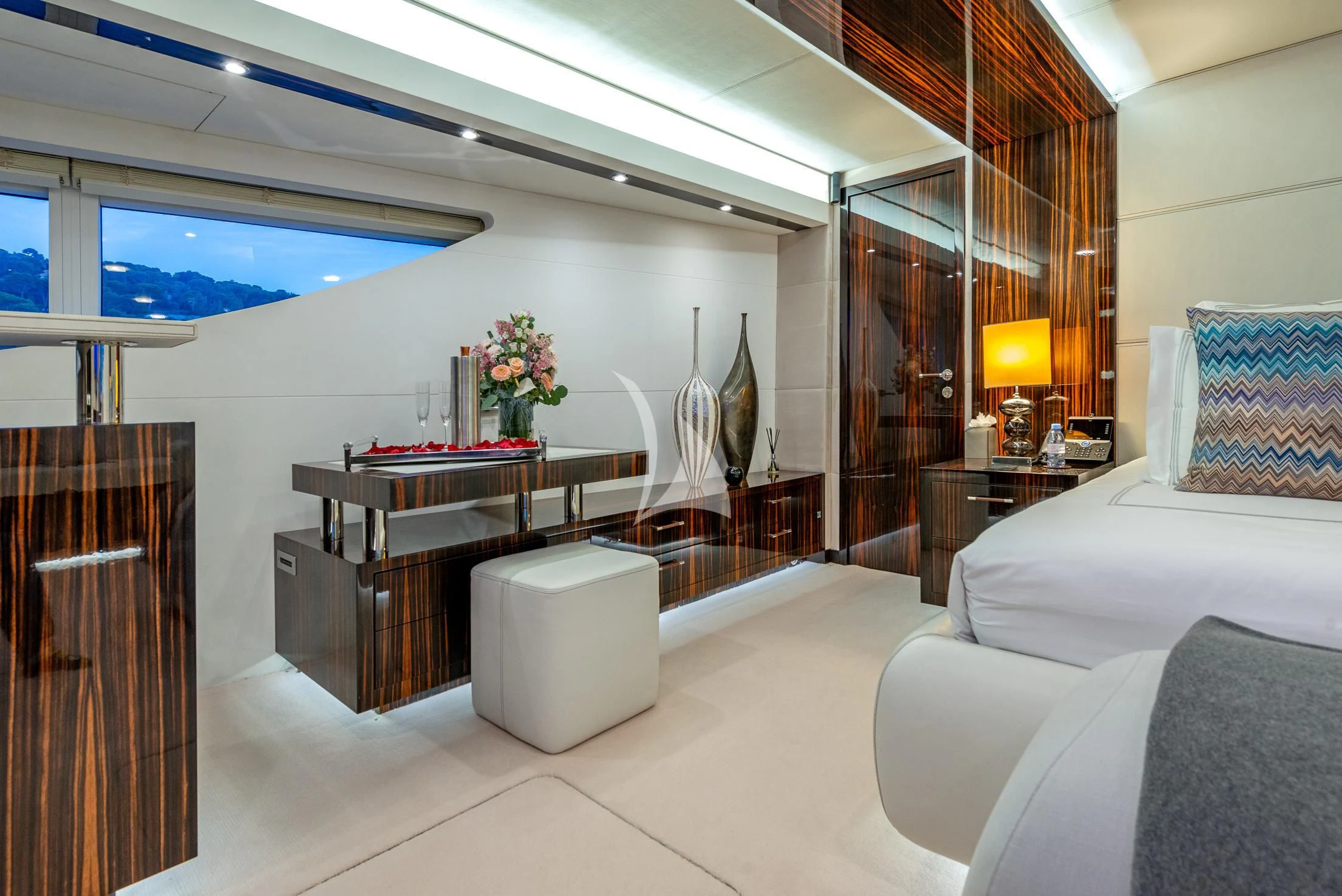 a room with a bed and a desk aboard GEMS 2 Yacht for Sale