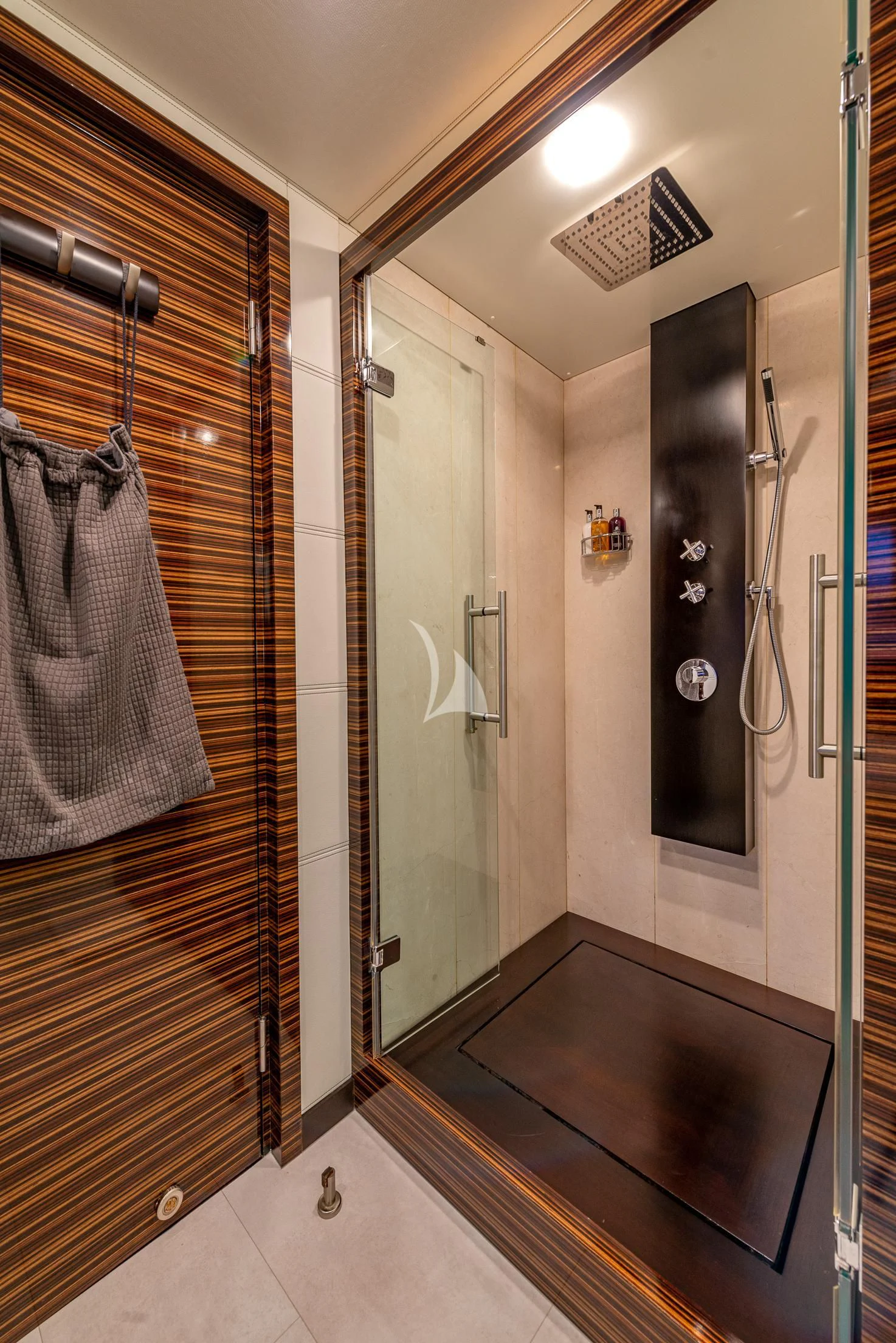 a bathroom with a shower unit aboard GEMS 2 Yacht for Sale