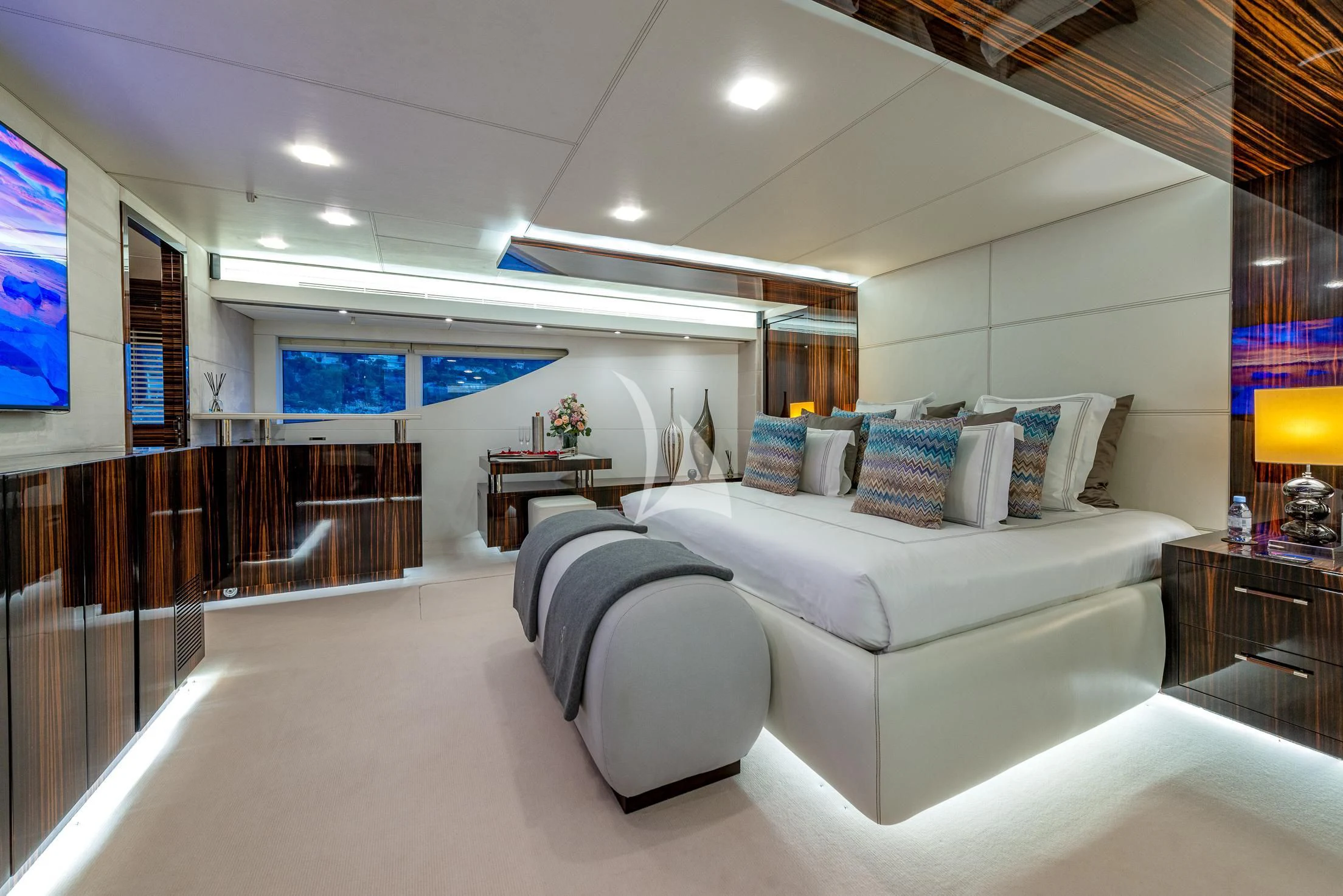 a room with a bed and a table aboard GEMS 2 Yacht for Sale