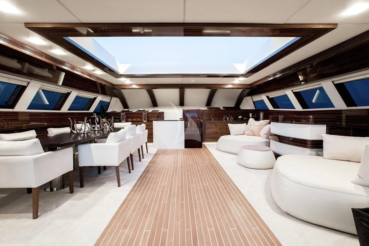a room with a large stage and a large window aboard GEMS 2 Yacht for Sale