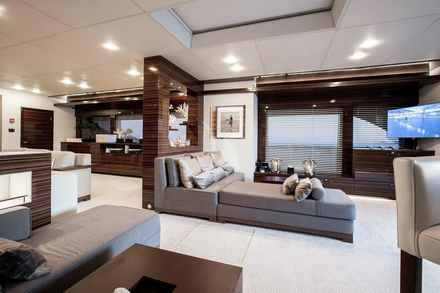 a living room with a large window aboard GEMS 2 Yacht for Sale