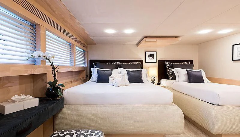 a room with two beds aboard GEMS 2 Yacht for Sale
