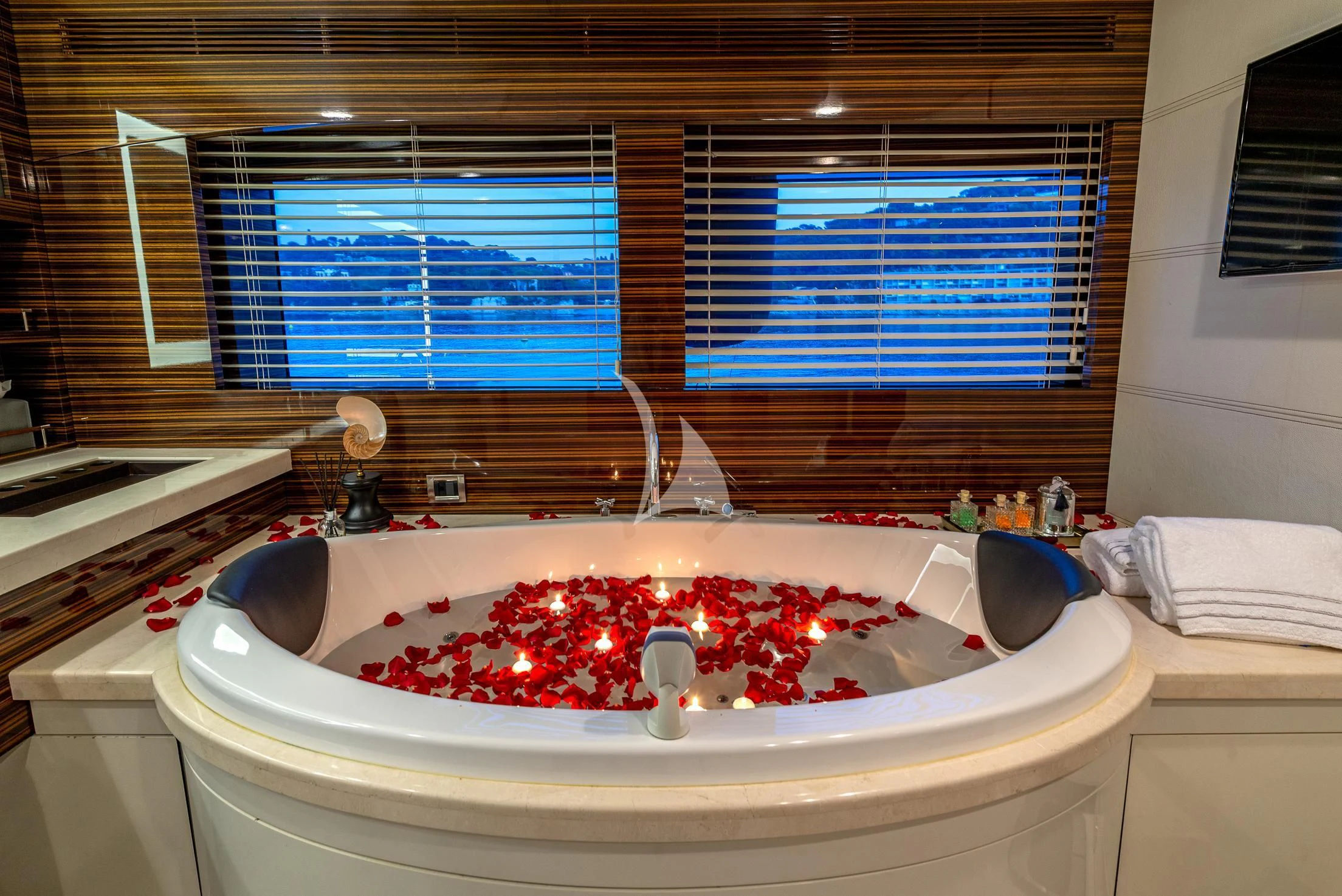 a bathtub with flowers in it aboard GEMS 2 Yacht for Sale
