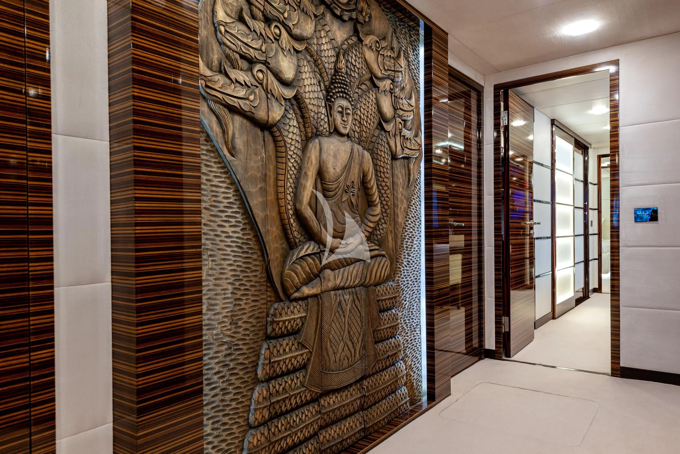 a wall with art on it aboard GEMS 2 Yacht for Sale