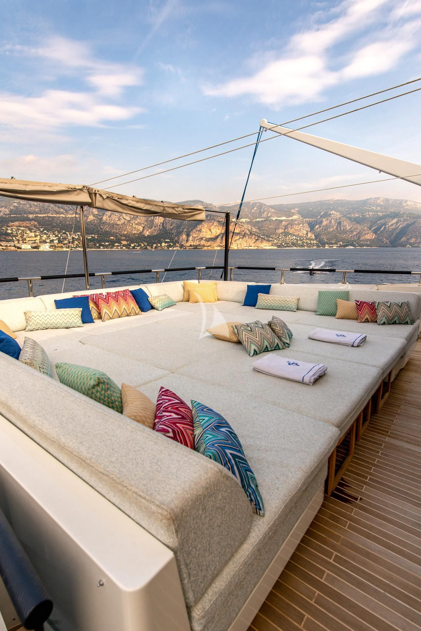 a bed on a deck aboard GEMS 2 Yacht for Sale