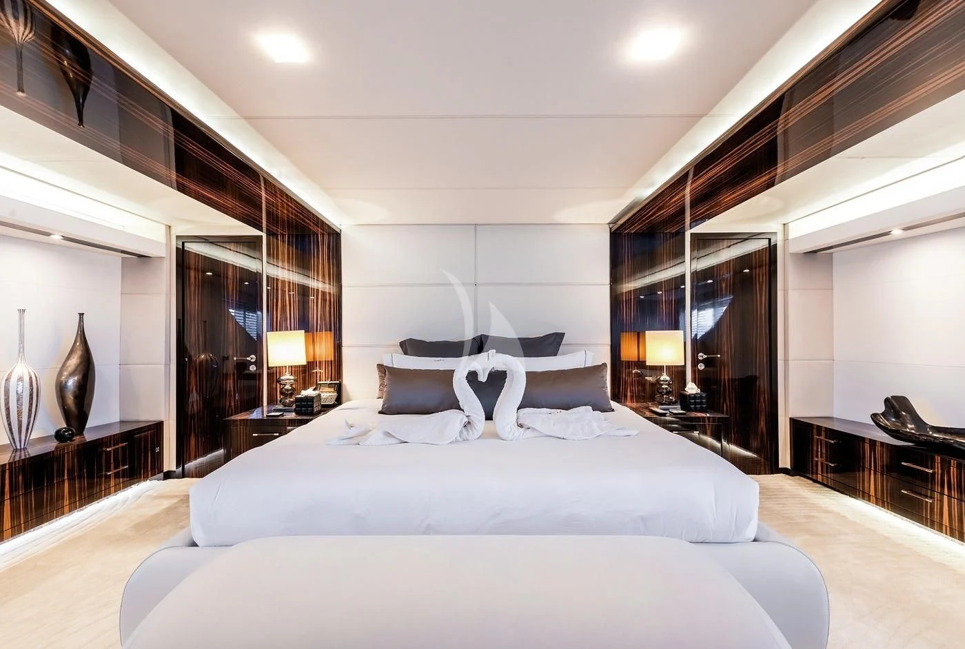 a large bedroom with a large bed aboard GEMS 2 Yacht for Sale