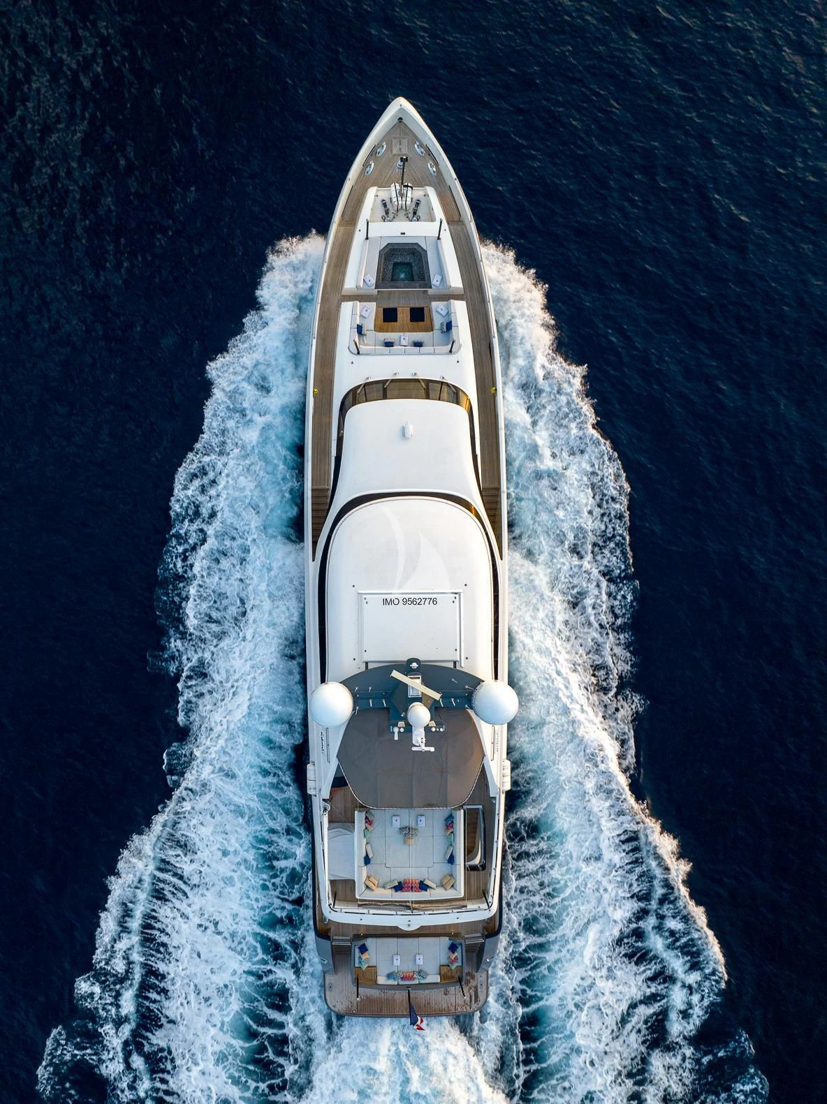 a white ship in the water aboard GEMS 2 Yacht for Sale
