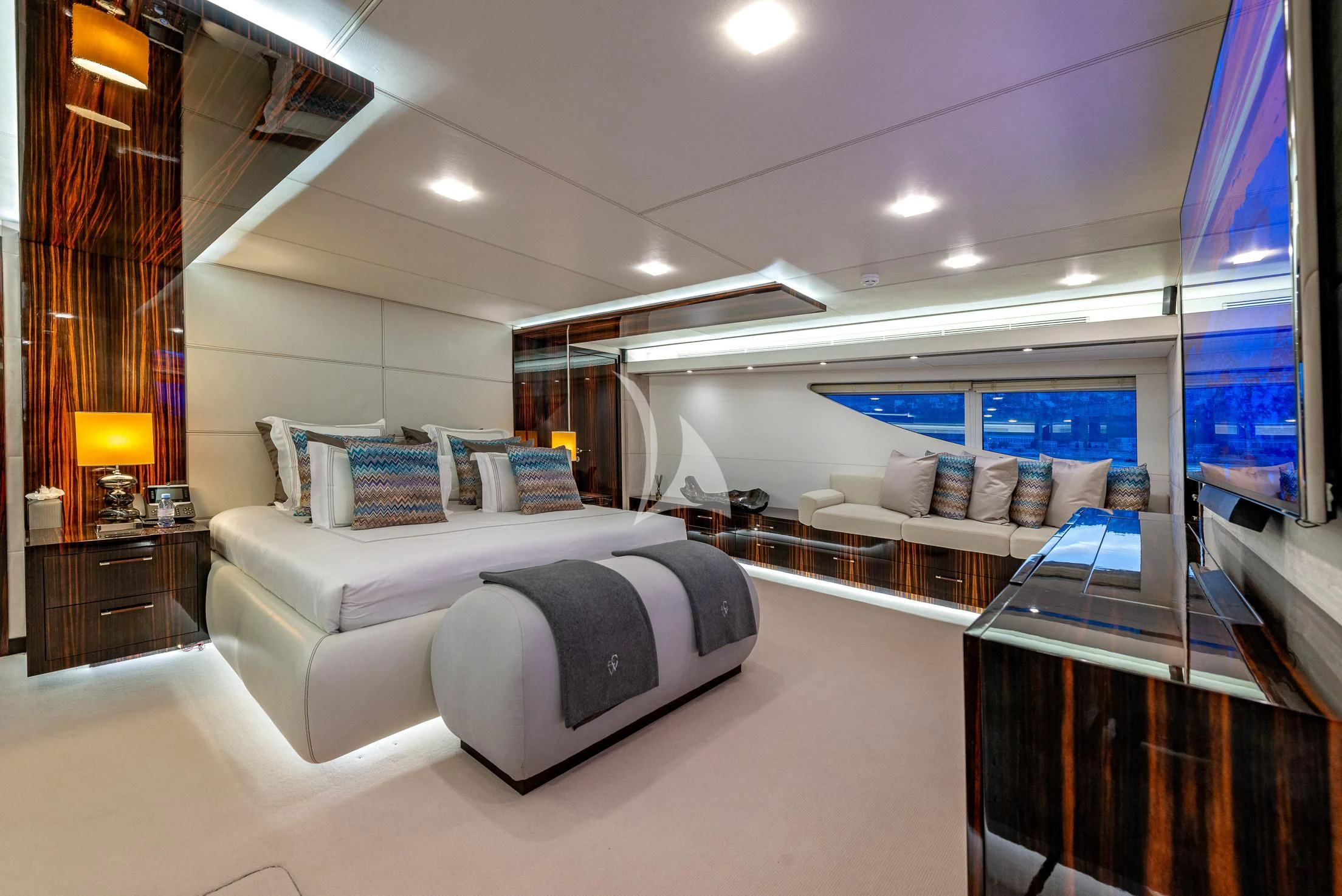 a room with a bed and a desk aboard GEMS 2 Yacht for Sale