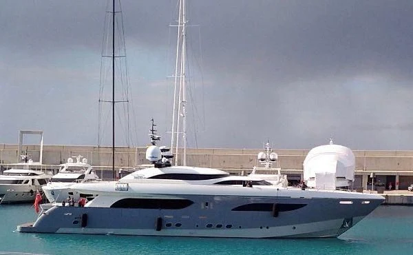 a boat in a harbor aboard GEMS 2 Yacht for Sale