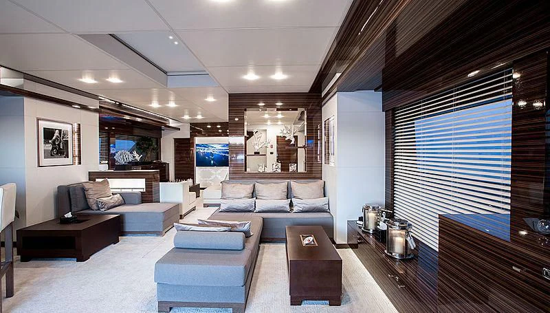 a living room with a large window aboard GEMS 2 Yacht for Sale