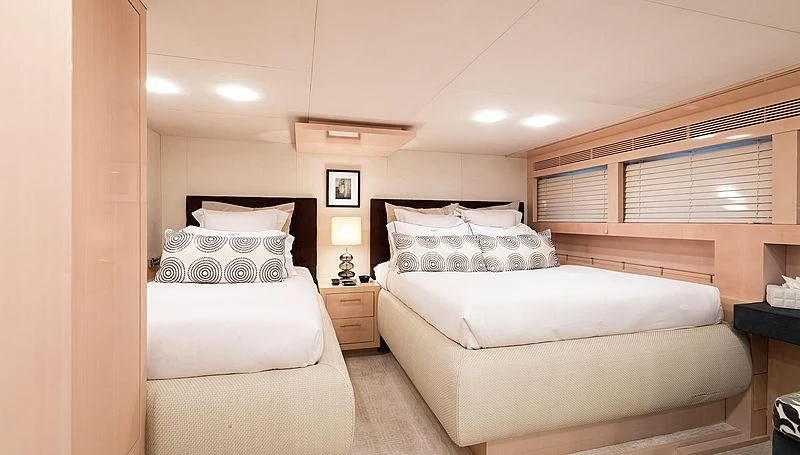 a room with two beds aboard GEMS 2 Yacht for Sale