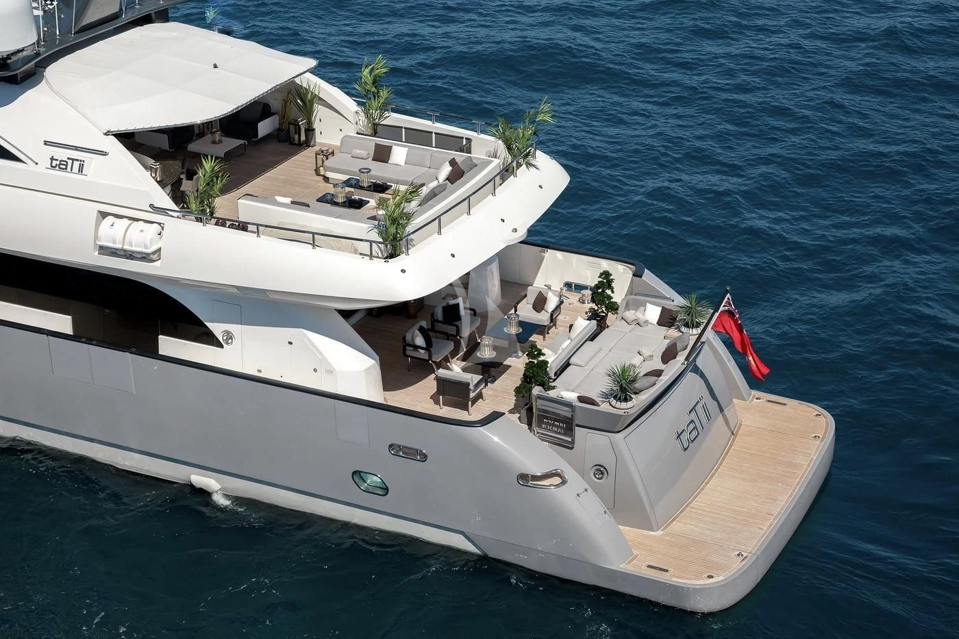 a large white boat on the water aboard GEMS 2 Yacht for Sale