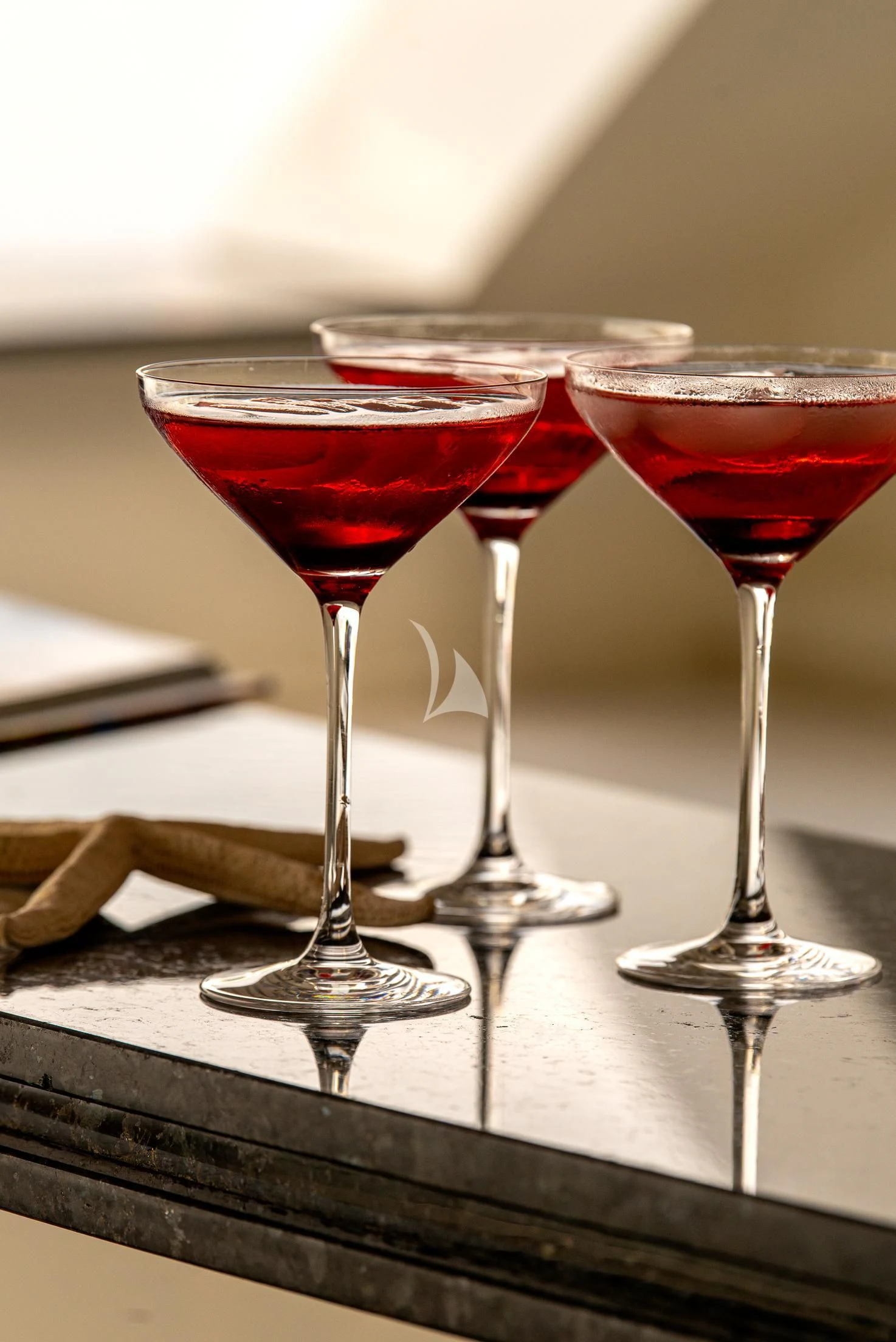 a group of wine glasses aboard GEMS 2 Yacht for Sale