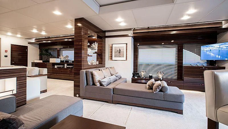a living room with a large window aboard GEMS 2 Yacht for Sale