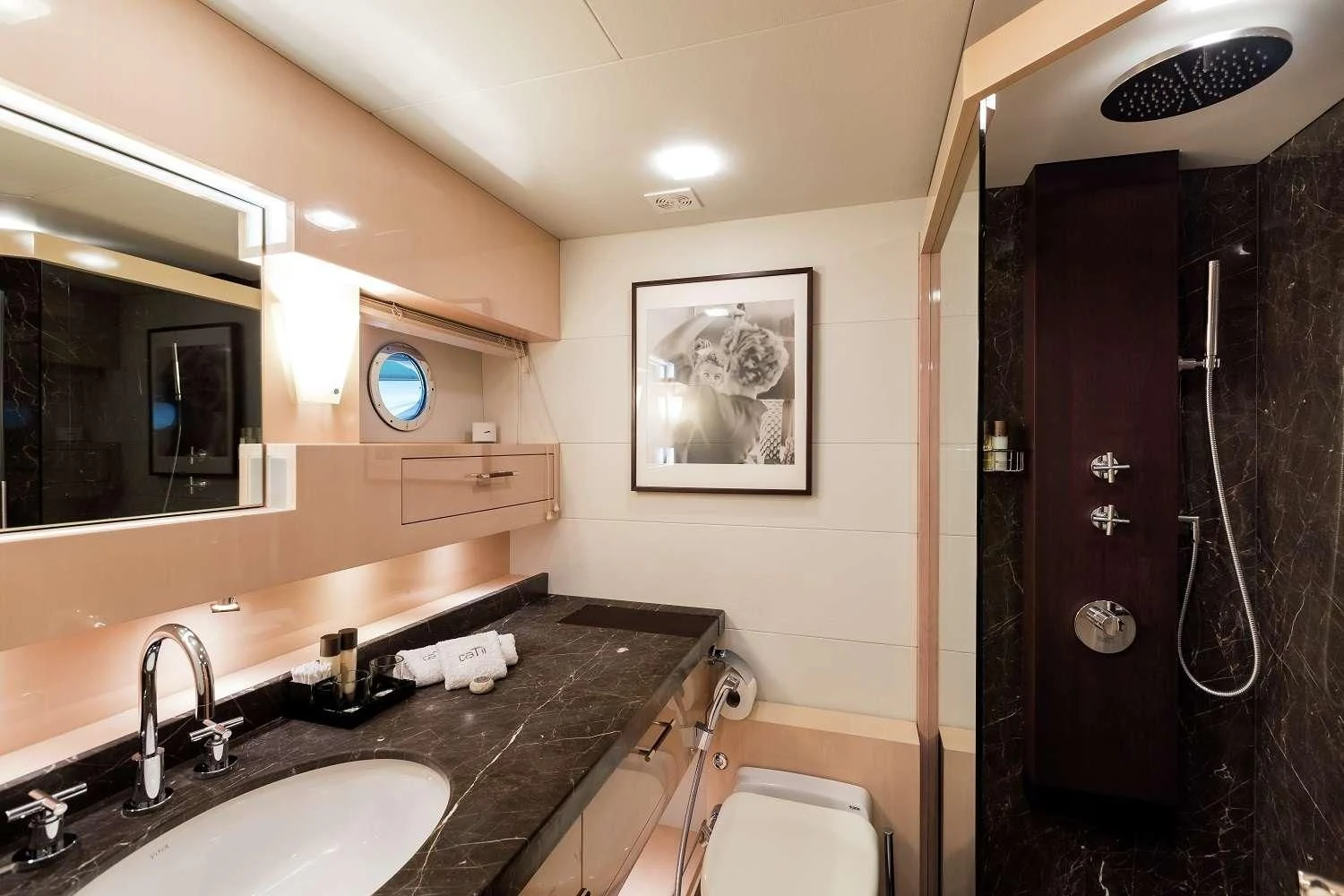 a bathroom with a marble counter top aboard GEMS 2 Yacht for Sale