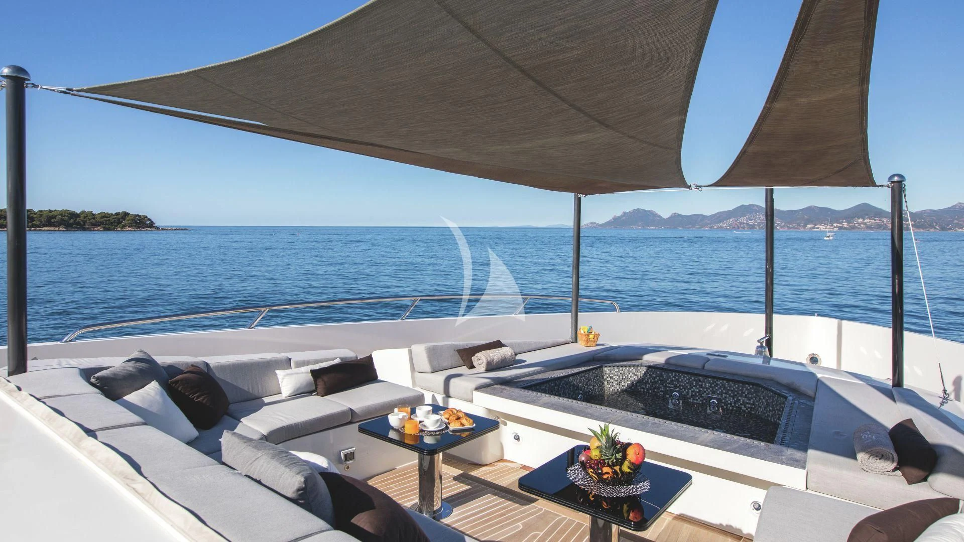 a large boat on the water aboard GEMS 2 Yacht for Sale