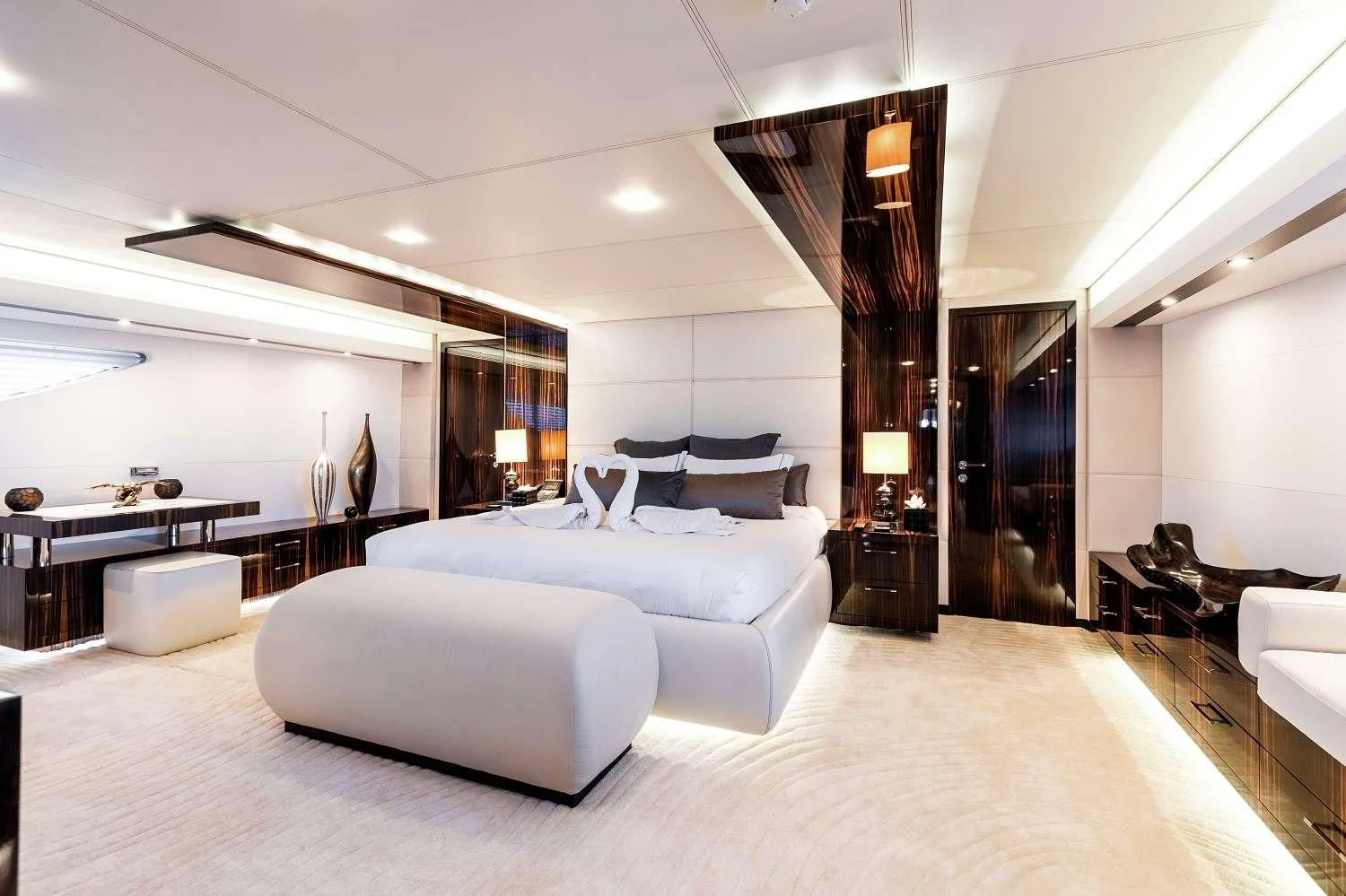 a large bedroom with a large bed aboard GEMS 2 Yacht for Sale