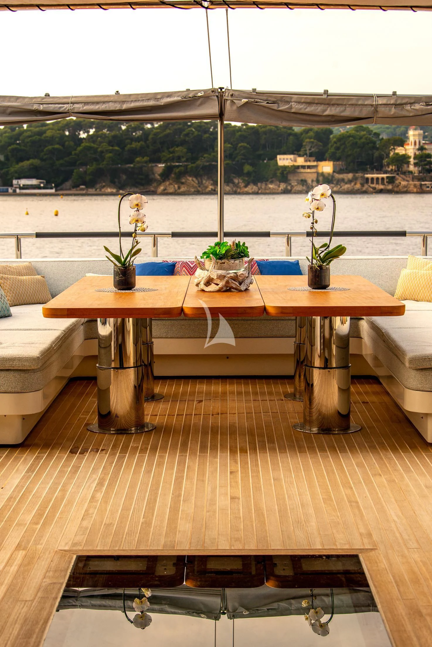 a table with plants on it aboard GEMS 2 Yacht for Sale