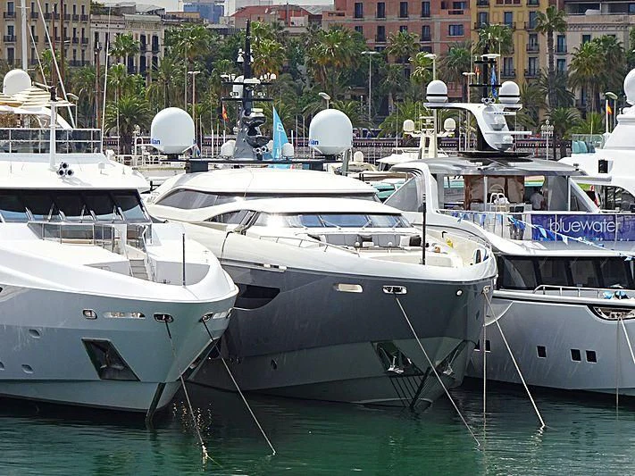 several boats docked in a harbor aboard GEMS 2 Yacht for Sale