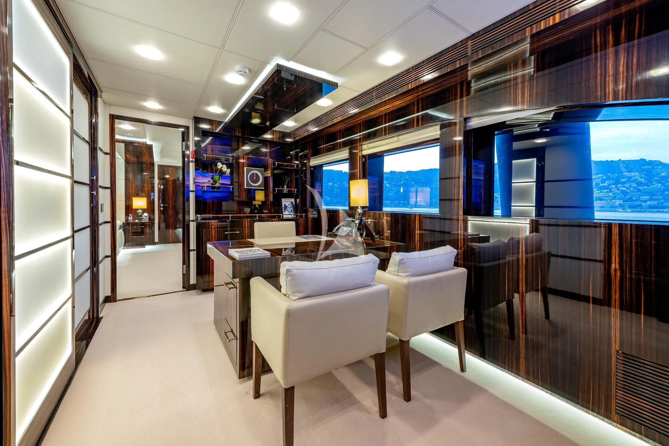 a room with chairs and a table aboard GEMS 2 Yacht for Sale