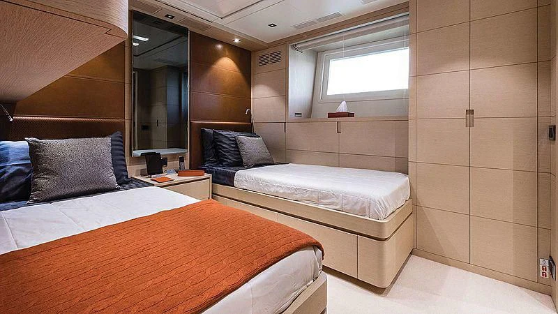 a room with two beds aboard ABVIOS Yacht for Sale