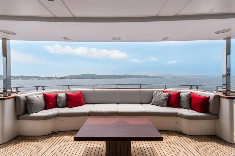 a couch with pillows on it aboard ABVIOS Yacht for Sale