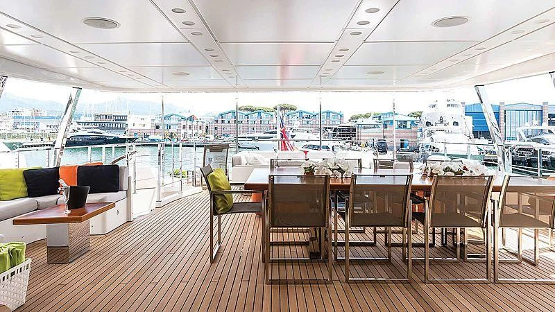 a room with a view of a city and a harbor aboard ABVIOS Yacht for Sale