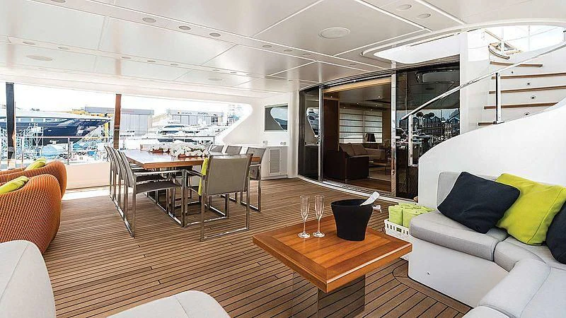 a living room with a large glass window aboard ABVIOS Yacht for Sale