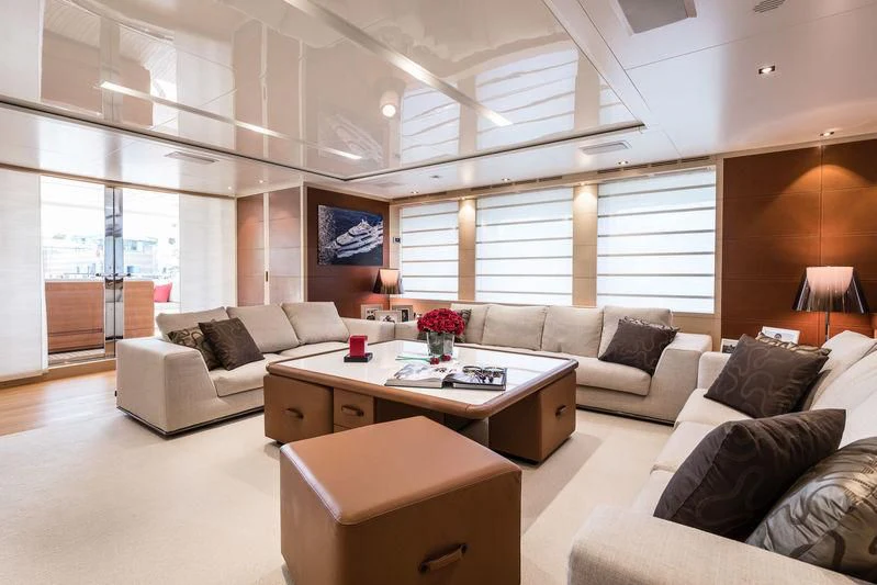 a living room with a couch and a coffee table aboard ABVIOS Yacht for Sale