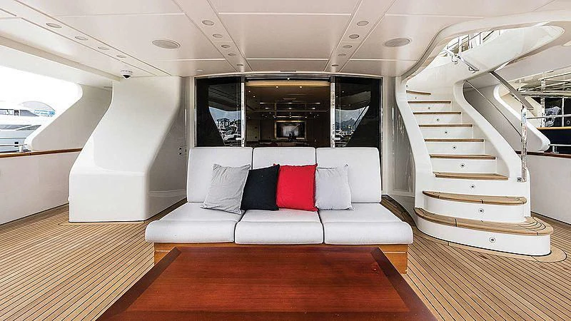 a white couch in a room aboard ABVIOS Yacht for Sale