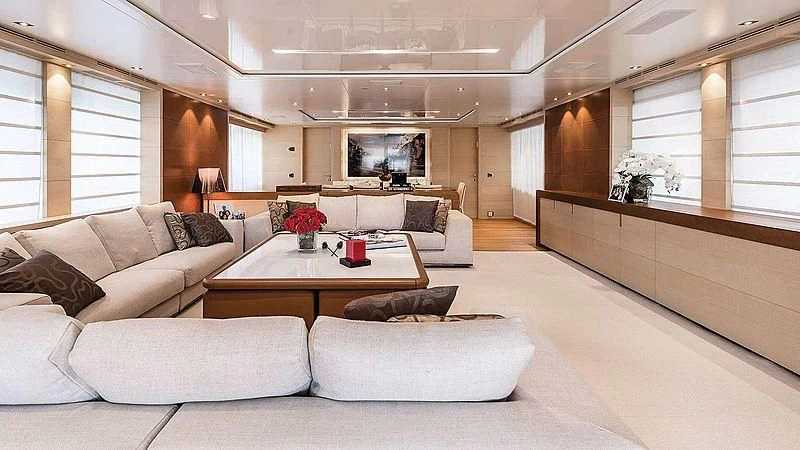 a living room with a couch and a coffee table aboard ABVIOS Yacht for Sale