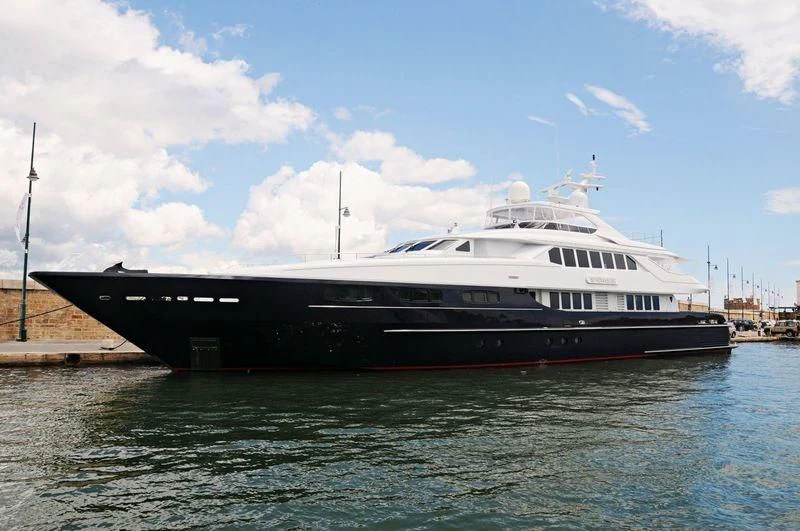 a large boat on the water aboard YOU & ME Yacht for Sale