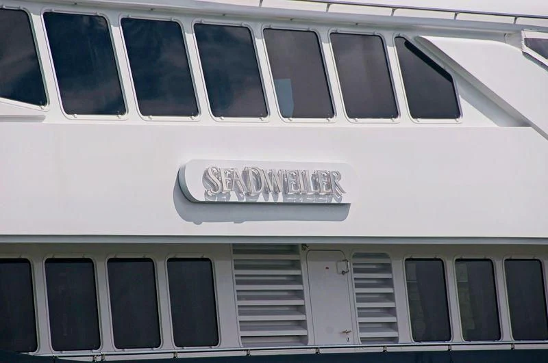 a train with a sign on the window aboard YOU & ME Yacht for Sale
