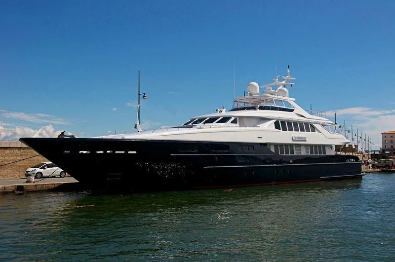 a large boat in the water aboard YOU & ME Yacht for Sale