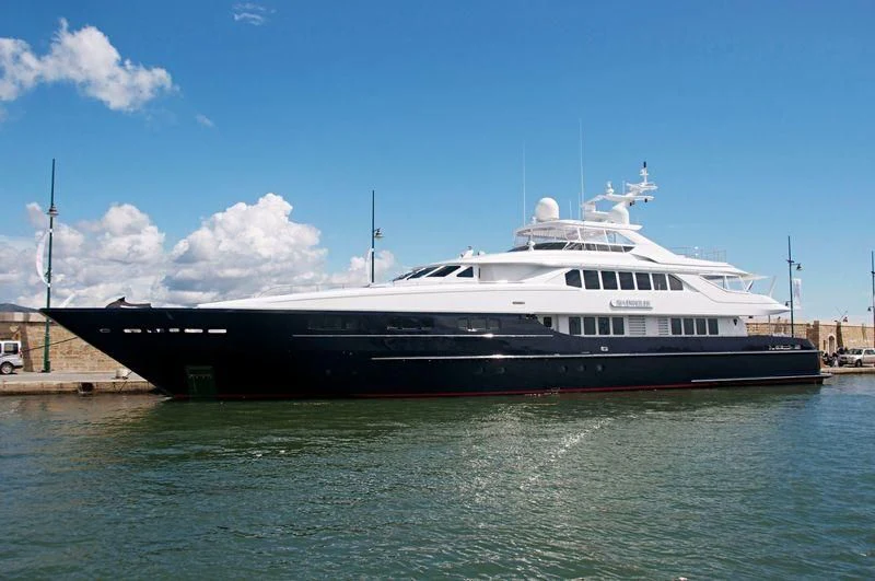 a large boat on the water aboard YOU & ME Yacht for Sale