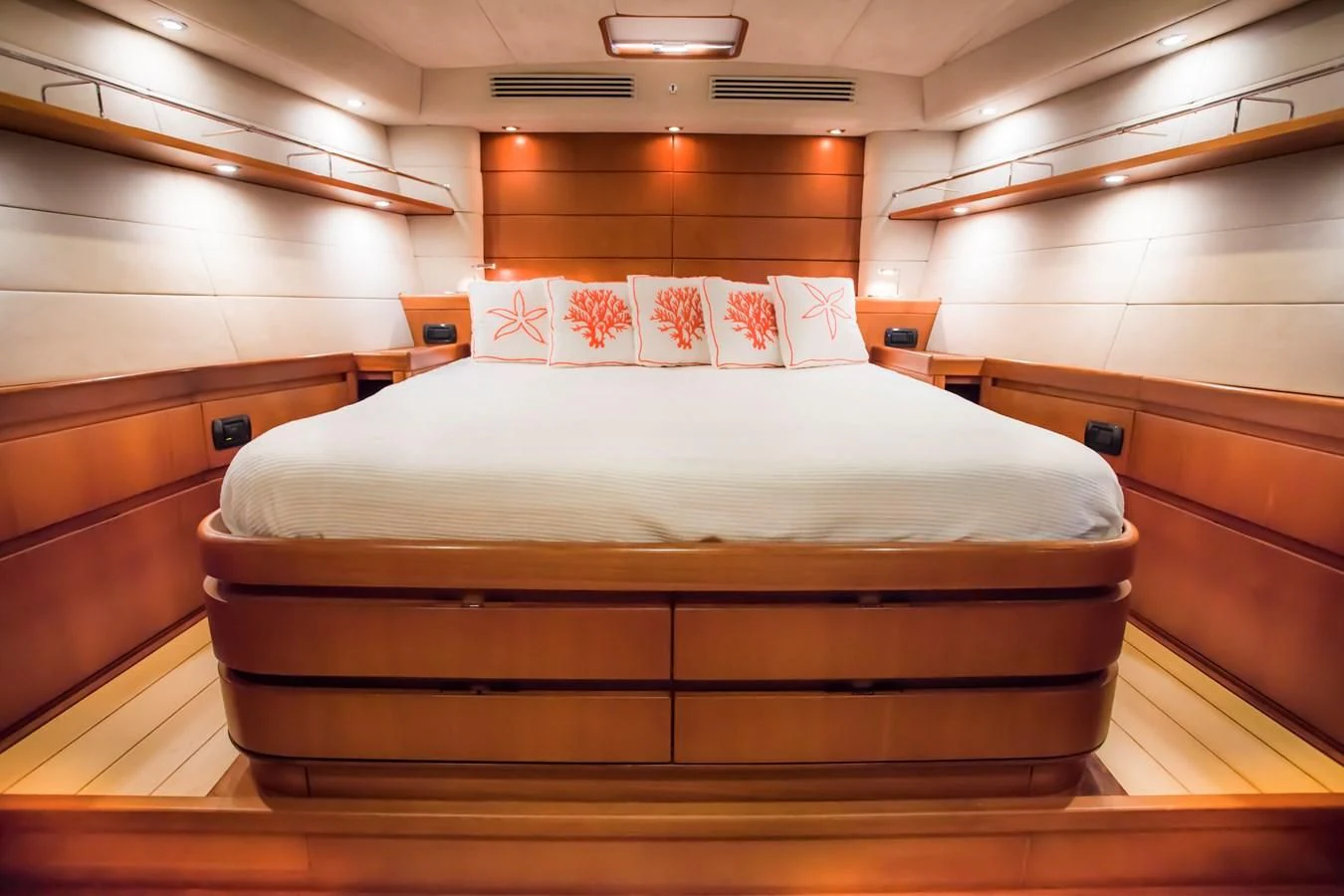 a bed in a room aboard KIWI Yacht for Sale