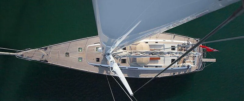 a white helicopter in the air aboard KIWI Yacht for Sale