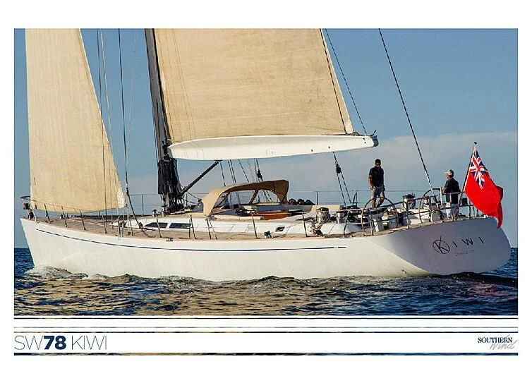 a sailboat with a flag on it aboard KIWI Yacht for Sale