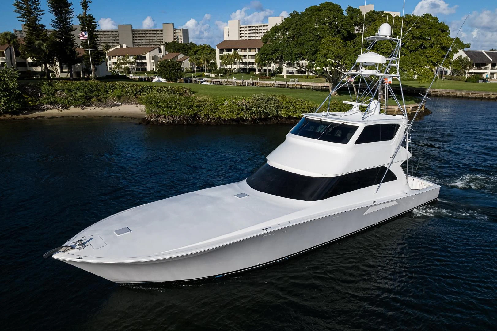 a white boat on water aboard KNOT RACING Yacht for Sale
