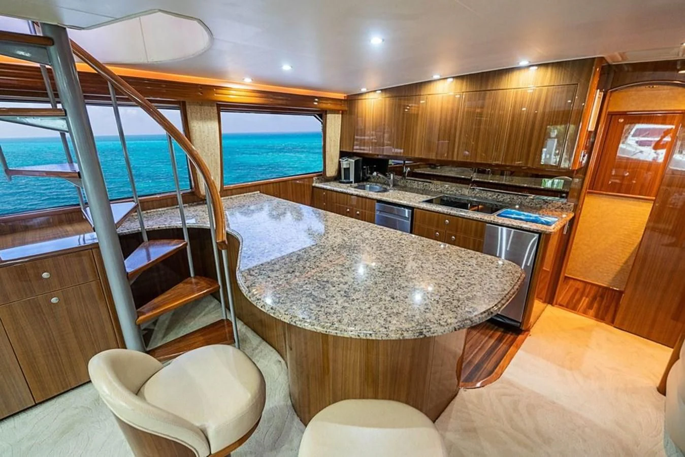 a kitchen with a large island aboard KNOT RACING Yacht for Sale