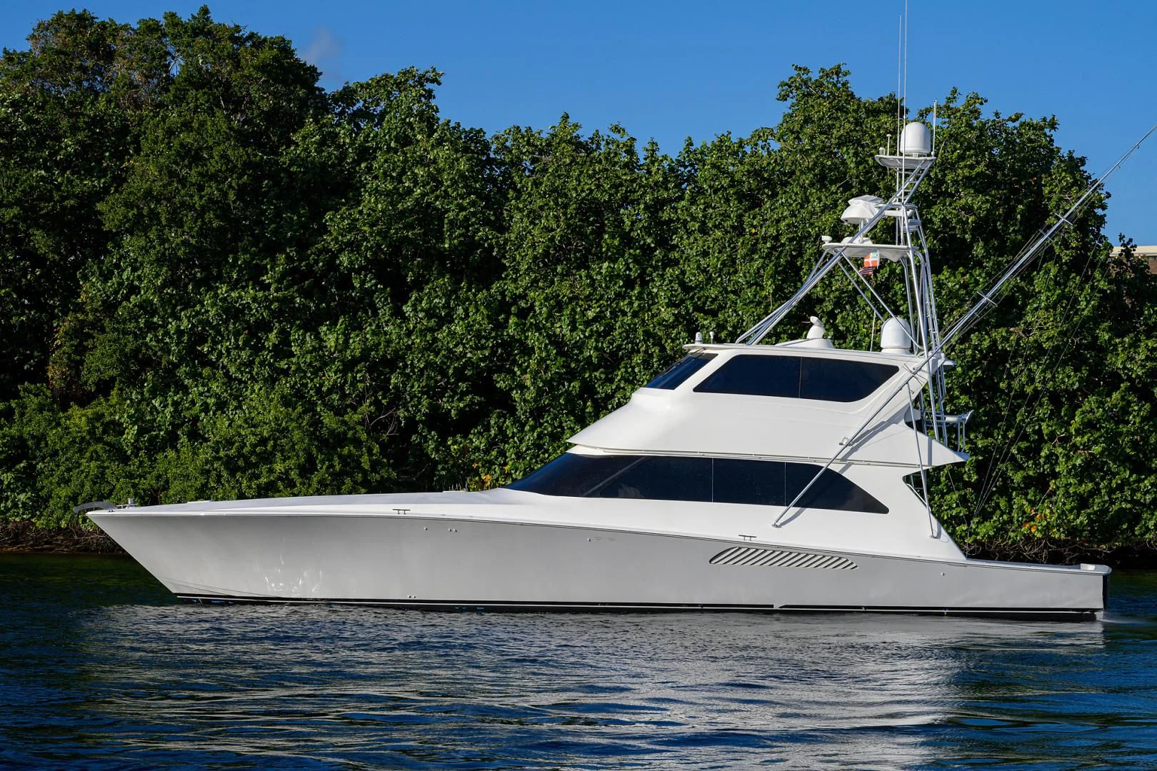 a white boat on water aboard KNOT RACING Yacht for Sale