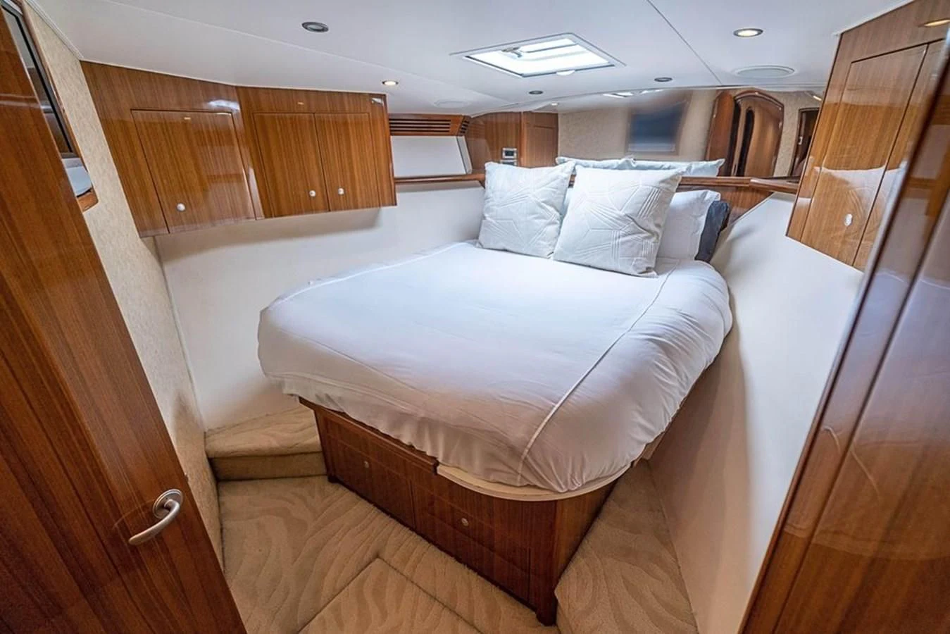 a bed in a room aboard KNOT RACING Yacht for Sale