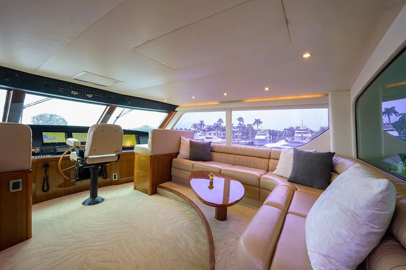 a living room with a couch and a table aboard KNOT RACING Yacht for Sale