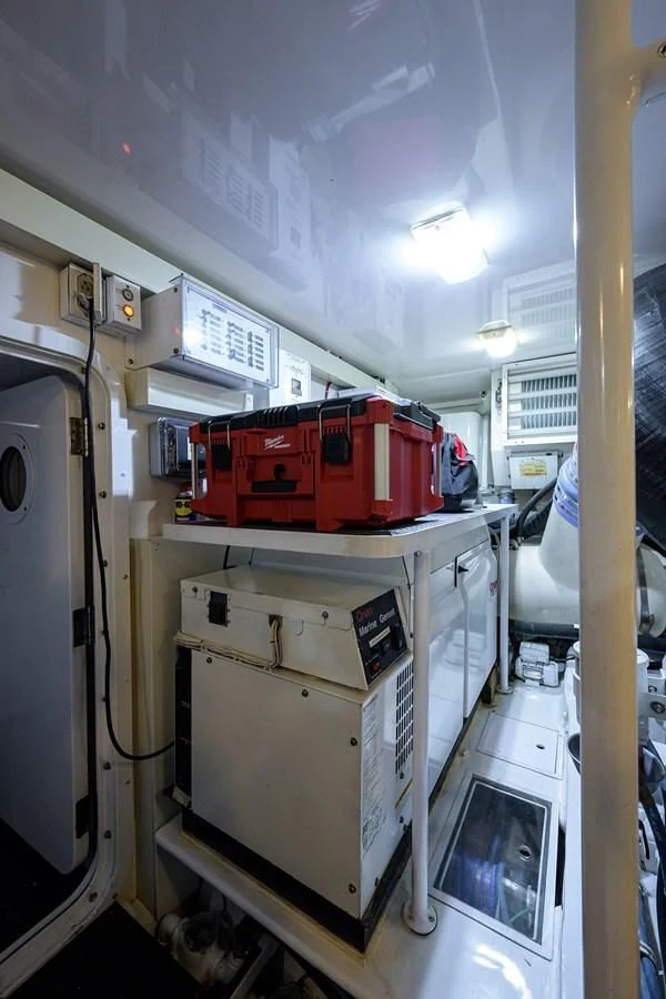 a large machine in a room aboard KNOT RACING Yacht for Sale
